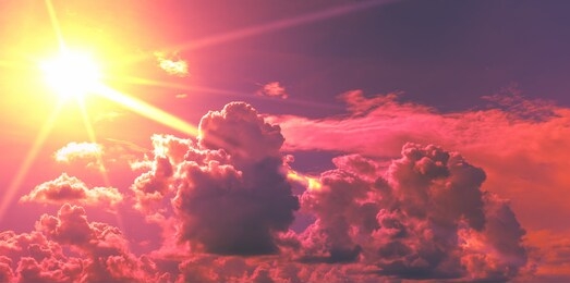 bright orange sunrise on pink red neon color clouds with dim sky