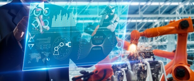 machine learning,ai,artificial intelligence,big data,deep learning,industry 4th and iot concept.engineer hand using tablet heavy automation robot arm machine in smart factory industrial with table.