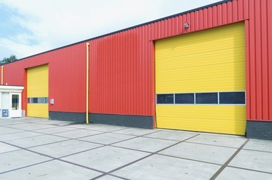 yellow roller doors in an industrial warehouse