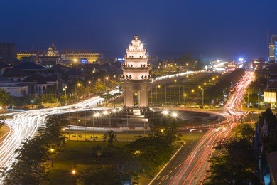 traffic swirls around the independence monument in downtown phnom penh, cambodia