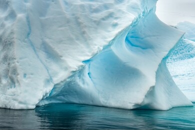 background from old iceberg in water in antarctica