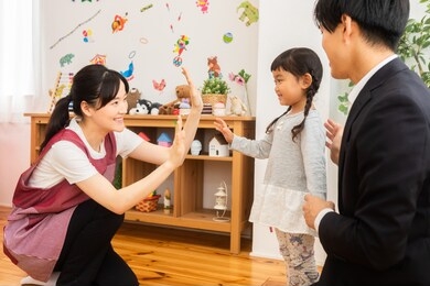 parents picking up their nursery school