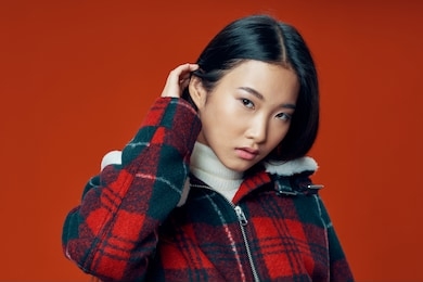 cheerful pretty woman asian appearance checkered jacket lifestyle winter