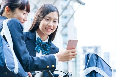 female student with a smartphone