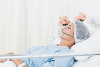 young female patient receiving artificial ventilation in the hospital