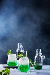 summer cocktail with mint and crushed ice, selective focus image