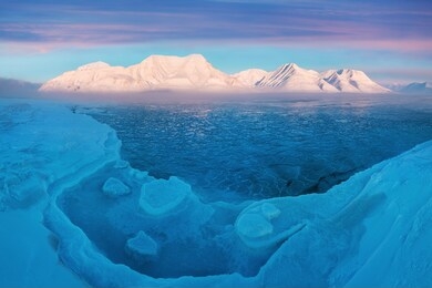 norway landscape ice nature of the glacier mountains of spitsbergen, longyearbyen, svalbard. arctic ocean during winter polar day and colorful sunset sky
arctica area, global warming 
amazing nature 