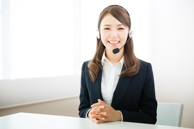 young attractive asian woman who works as an operator
