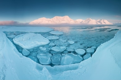 norway landscape ice nature of the glacier mountains of spitsbergen, longyearbyen, svalbard. arctic ocean during winter polar day and colorful sunset sky
arctica area, global warming 
amazing nature 