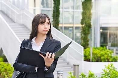 young asian woman wearing suits. job hunting.