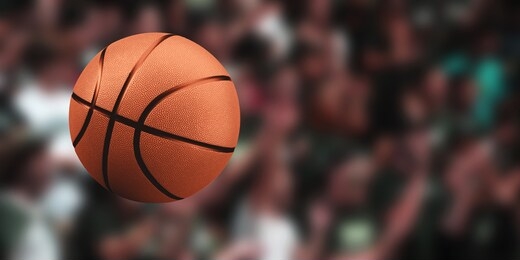 basketball ball on a blurred background of a crowd of people. sport competitions.