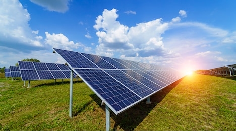solar panels on the sky background. solar power plant. blue solar panels. alternative source of electricity. solar farm.