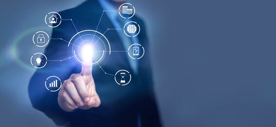 closeup concept of a male asian businessman standing pointing up a finger, wearing black suit, shirt and tie, representing interaction in technology within business industry, with grey flat background