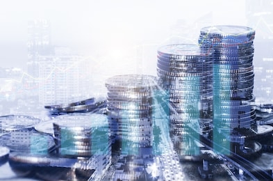 double exposure many coins stack with growth graph and chart and city background. business financial banking and money saving concept.
