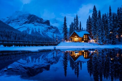 blue hour overlooking emerald lake with emerald lake lodge in the background