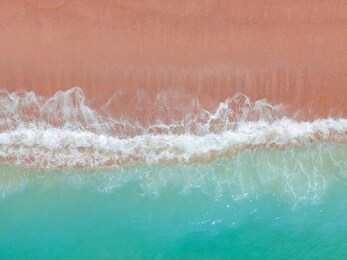 aerial pink sand beach indonesia