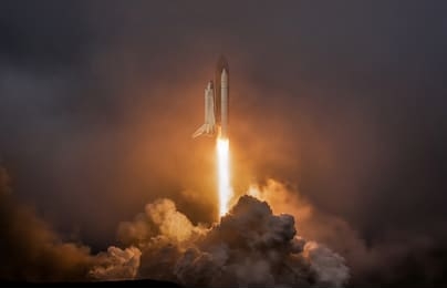 rocket liftoff. shuttle spaceship launch in the clouds sky. spaceship begins the mission. space shuttle taking off on a mission. concept space travel to mars
