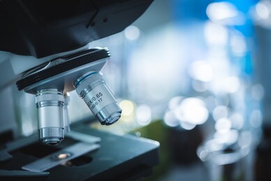 microscope close-up in laboratory, science research concept