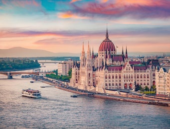 amazing evening view of parliament house. stunning spring cityscape of budapest. great sunset in hungary, europe. traveling concept background.
