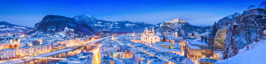 panoramic view of the historic city of salzburg with festung hohensalzburg and river salzach in winter, salzburger land, austria