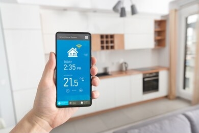 smart home system on phone app. temperature, energy efficiency, security control.