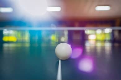 blurred table tennis ball on table for player play this sport