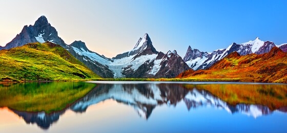 sunrise view on bernese range above bachalpsee lake. peaks eiger, jungfrau, faulhorn in famous location in switzerland alps, grindelwald valley