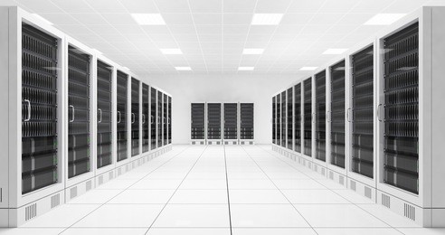 data center with two rows of computers in white room