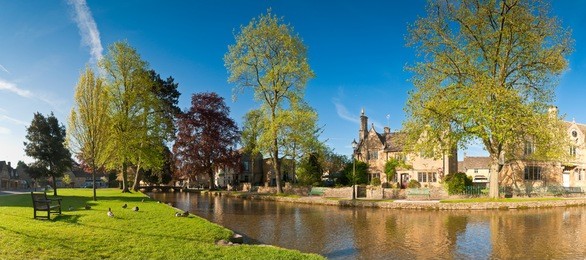 village scene bourton on the water, uk