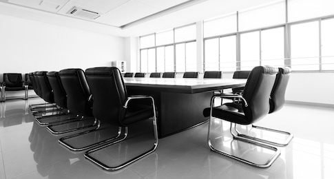 conference table and chairs in modern meeting room.