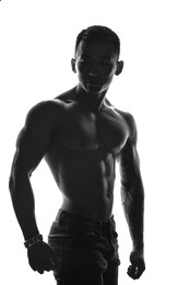 dark silhouette of a strong man on white background