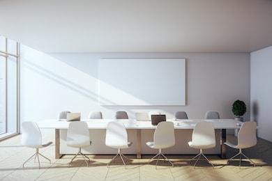 contemporary conference interior with laptop and blank poster on wall with city view. workplace and corporate concept. 3d rendering