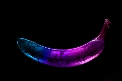 colored banana on black background multicolor gradient animation neon style