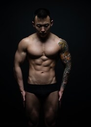 muscled shirtless asian male model