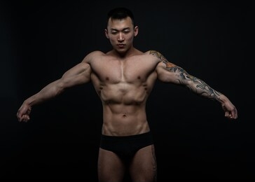 muscled shirtless asian male model