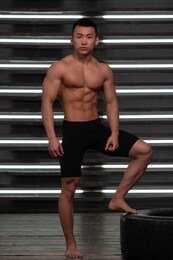 muscled shirtless asian male model