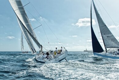 race of sailing yachts. sails in the sea. yachting