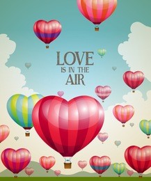 heart-shaped hot air balloons taking off with a vintage effect