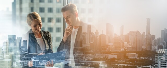 double exposure of meeting and discussion concept.business people communicating in office.mature businessman discuss information with a colleague in a modern business lounge high up in an office tower