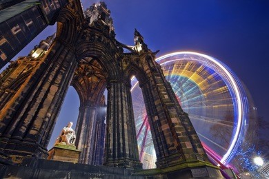 horizontal colour image of scott monument and russian wheel in the background, edinburgh, scotland