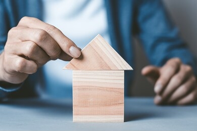 man assembling a building house
