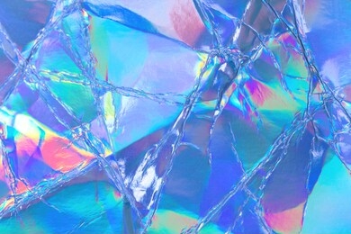 blurred abstract modern pastel colored holographic background in 80s style. crumpled iridescent foil real texture. synthwave. vaporwave style. retrowave, retro futurism, webpunk