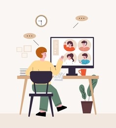 man freelancer. sit at the desk and have a video conference. telecommuting at home.