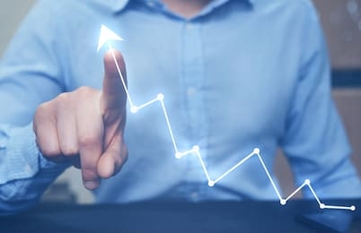 businessman pointing arrow graph growing corporate. development  to success and growing growth concept.  defocused or blurred background.
