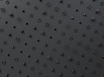 3d render background with black geometry figures on black paper. perfect minimalist pattern. place for your text.