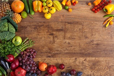 healthy eating background / studio photography of different fruits and vegetables on old wooden table 