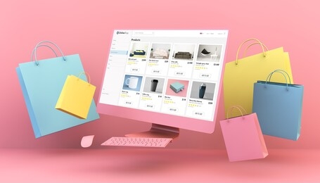 floating computer online shop and shopping bags in pink background 3d rendering