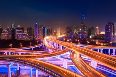 modern city traffic at night ,colorful interchange overpass  in shanghai