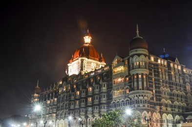 illuminated taj mahal palace at night in mumbai
