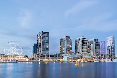 night time image of the docklands waterfront at night in melbourne, australia
